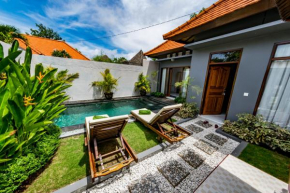 Гостиница The Wyn Villa  Kuta